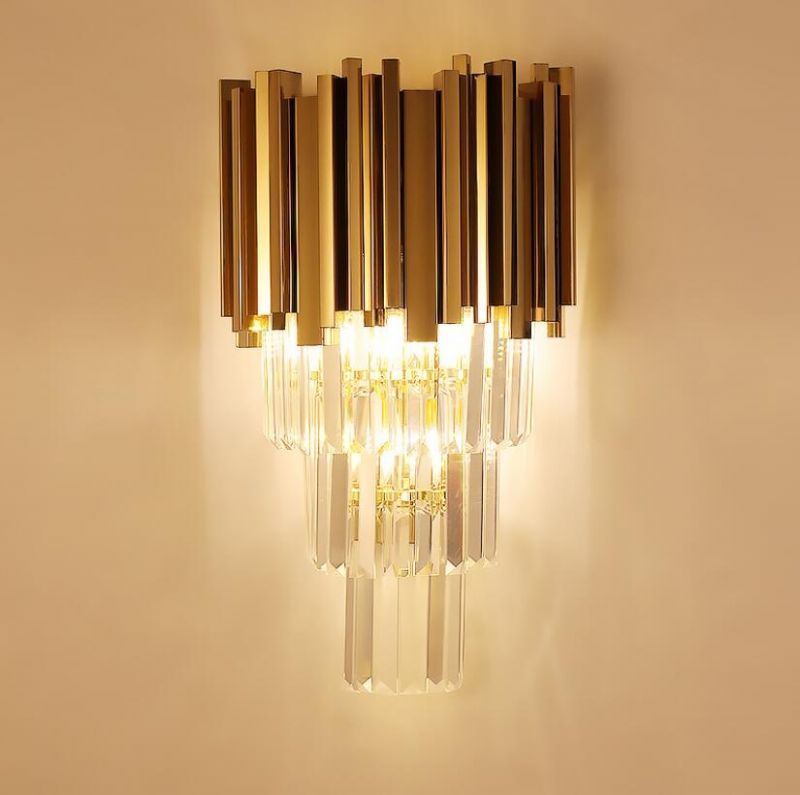 Polished brass wall sconce for villa