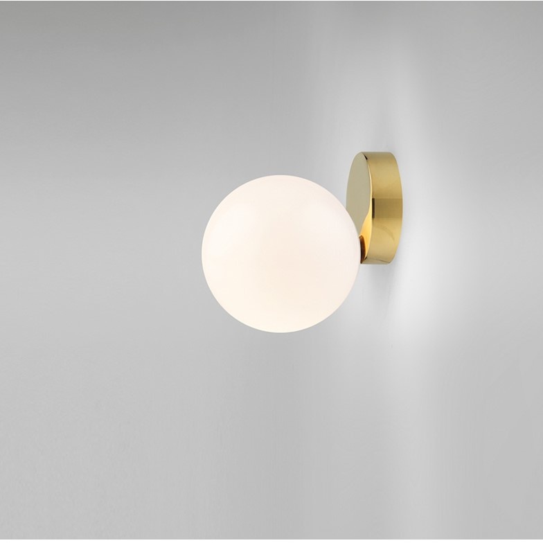 Bedside wall lamp with brass finish